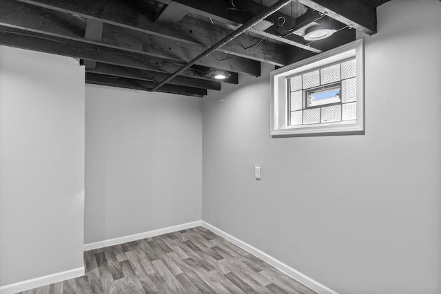 3009 N 72nd St, Milwaukee, WI 53210 - below grade area with wood finished floors and baseboards