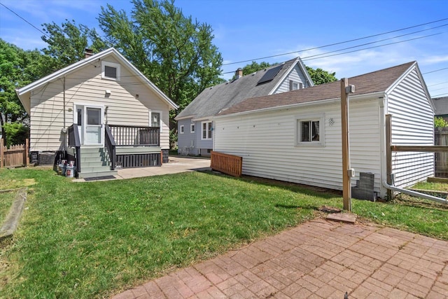 3009 N 72nd St, Milwaukee, WI 53210 - back of house featuring a patio and a deck