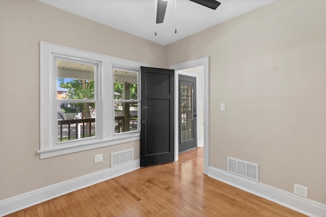 3009 N 72nd St, Milwaukee, WI 53210 - unfurnished room with light wood-style flooring and a ceiling fan
