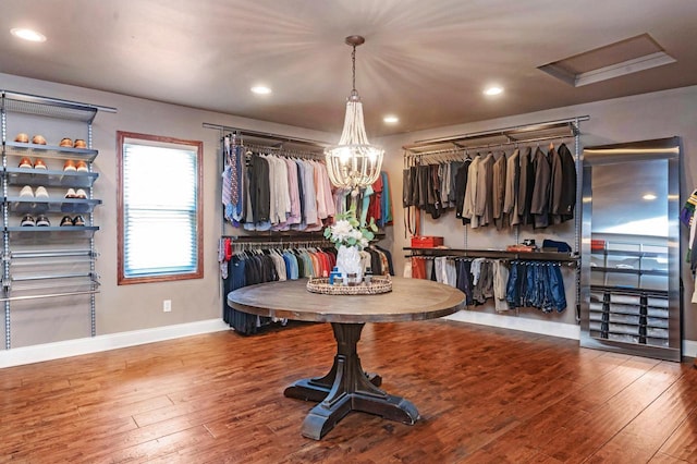 N69W29753 Ridgeview Ct, Hartland, WI 53029 - spacious closet with hardwood / wood-style floors and a chandelier