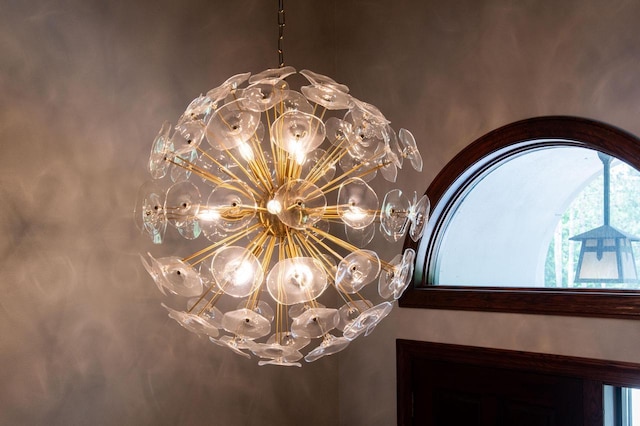 N69W29753 Ridgeview Ct, Hartland, WI 53029 - detailed view of a chandelier and arched walkways