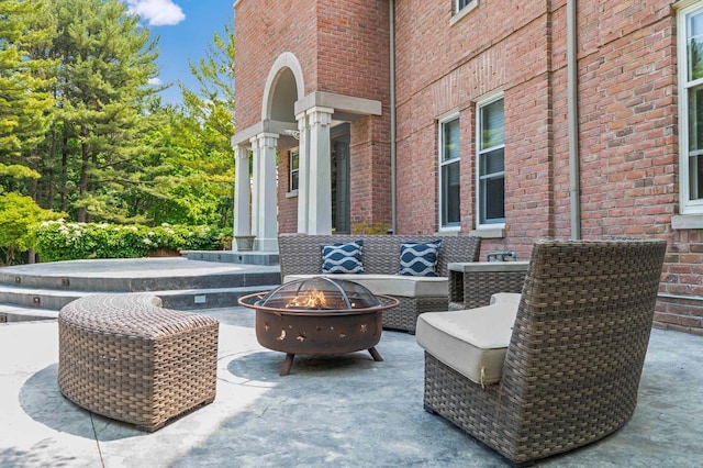N69W29753 Ridgeview Ct, Hartland, WI 53029 - view of patio featuring a fire pit
