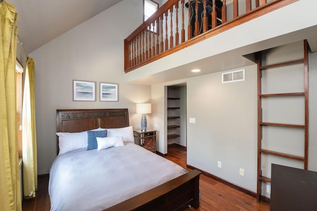 N69W29753 Ridgeview Ct, Hartland, WI 53029 - bedroom with wood finished floors, high vaulted ceiling, and recessed lighting
