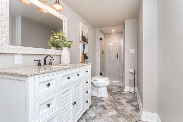 N69W29753 Ridgeview Ct, Hartland, WI 53029 - full bathroom with a shower stall, vanity, and stone finish flooring