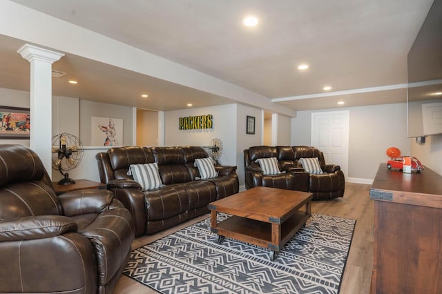 N69W29753 Ridgeview Ct, Hartland, WI 53029 - living area featuring ornate columns, wood finished floors, and recessed lighting