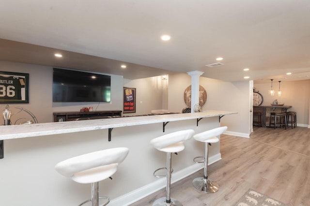 N69W29753 Ridgeview Ct, Hartland, WI 53029 - indoor bar featuring recessed lighting and light wood finished floors