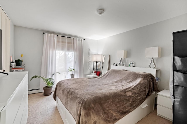 4050 W Rivers Edge Cir Unit 25, Brown Deer, WI 53209 - bedroom featuring light carpet and baseboard heating