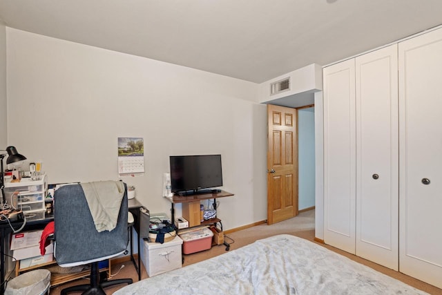 4050 W Rivers Edge Cir Unit 25, Brown Deer, WI 53209 - bedroom with an office area and a closet