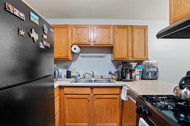 4050 W Rivers Edge Cir Unit 25, Brown Deer, WI 53209 - kitchen featuring freestanding refrigerator, gas stove, range hood, and light countertops
