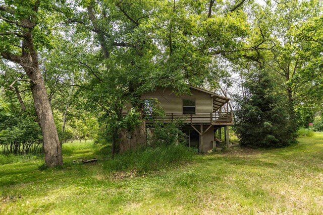 N5642 8th Dr, Westfield, WI 53964 - view of green lawn with a wooden deck