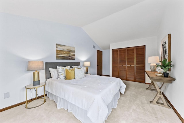 836 Pilgrim Pkwy, Elm Grove, WI 53122 - bedroom with vaulted ceiling, light carpet, and a closet