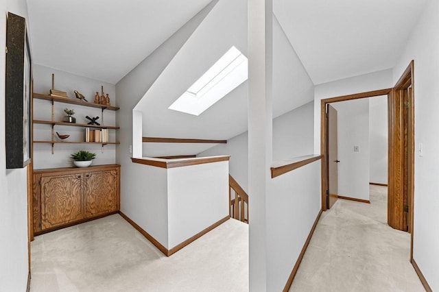 836 Pilgrim Pkwy, Elm Grove, WI 53122 - corridor featuring a skylight, an upstairs landing, and light colored carpet