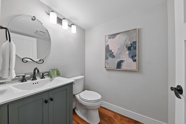 836 Pilgrim Pkwy, Elm Grove, WI 53122 - bathroom featuring wood finished floors and vanity