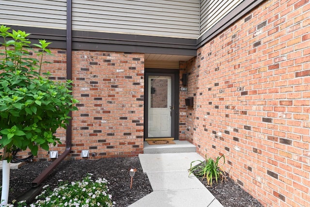 836 Pilgrim Pkwy, Elm Grove, WI 53122 - doorway to property featuring brick siding
