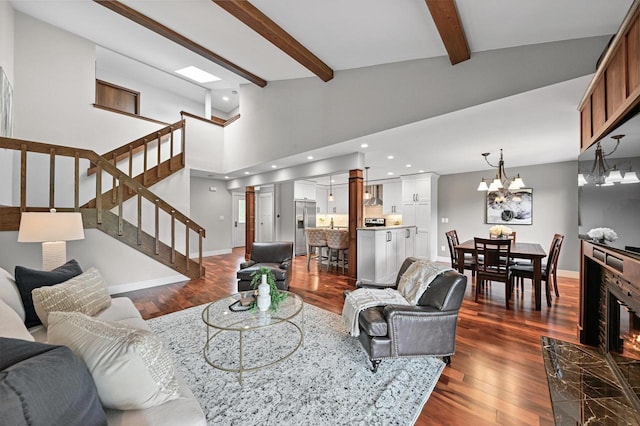 836 Pilgrim Pkwy, Elm Grove, WI 53122 - living area featuring stairway, beam ceiling, dark wood-type flooring, a chandelier, and recessed lighting