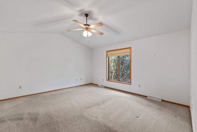 7062 S Fieldstone Ct, Franklin, WI 53132 - carpeted spare room featuring a ceiling fan and vaulted ceiling