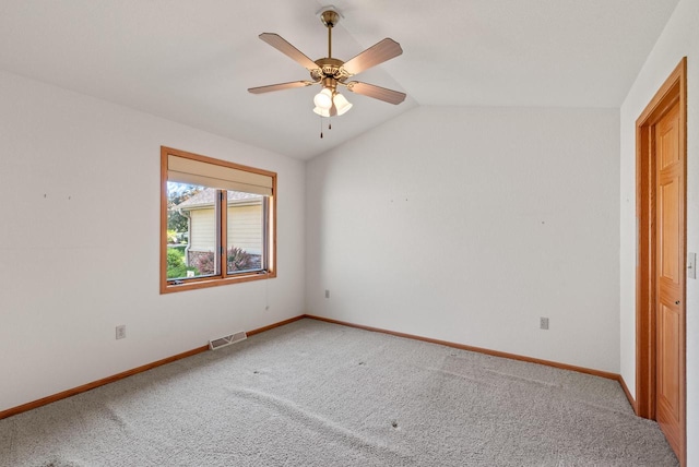 7062 S Fieldstone Ct, Franklin, WI 53132 - unfurnished bedroom with light carpet, vaulted ceiling, and a ceiling fan