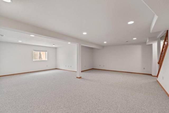 7062 S Fieldstone Ct, Franklin, WI 53132 - basement featuring light colored carpet, recessed lighting, and stairway