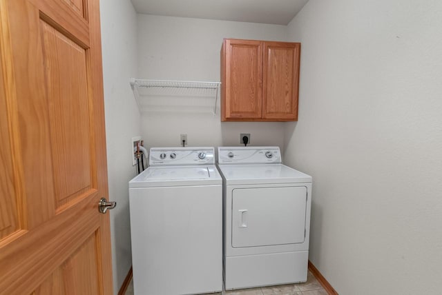 7062 S Fieldstone Ct, Franklin, WI 53132 - laundry room featuring cabinet space and washer and dryer