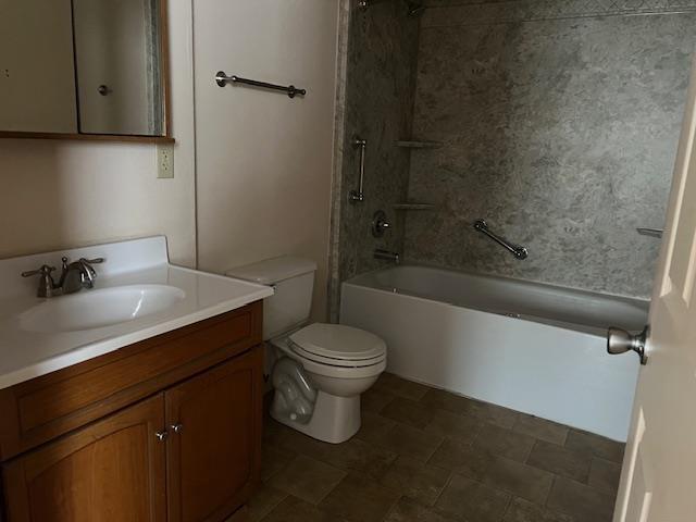 1153 W 7th Ave, Oshkosh, WI 54902 - bathroom with vanity and tub / shower combination