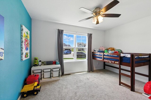 1143 Juniper Ln, Oconomowoc, WI 53066 - bedroom with carpet flooring and a ceiling fan