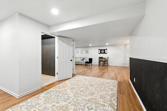 1143 Juniper Ln, Oconomowoc, WI 53066 - hallway with wood finished floors and recessed lighting
