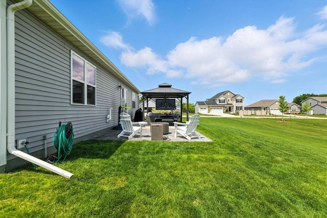 1143 Juniper Ln, Oconomowoc, WI 53066 - view of grassy yard featuring a gazebo, a patio, outdoor lounge area, and a residential view