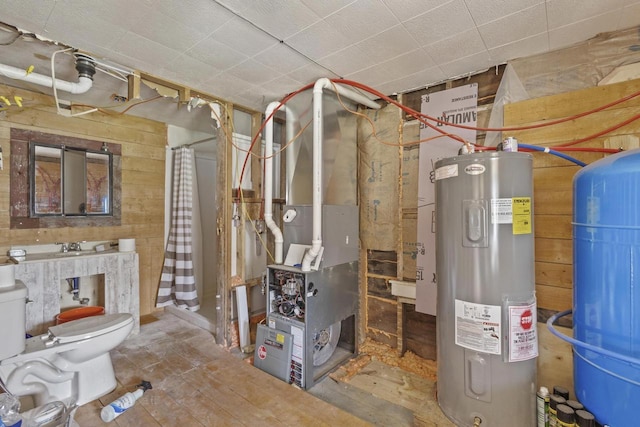 W6525 Beechnut Ave, Wild Rose, WI 54984 - utility room featuring water heater and heating unit