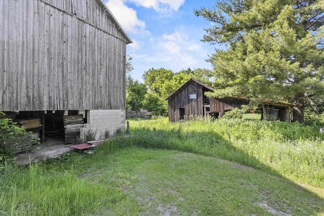 W6525 Beechnut Ave, Wild Rose, WI 54984 - view of yard with a barn and an outbuilding