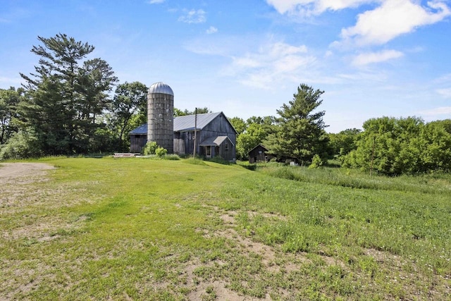W6525 Beechnut Ave, Wild Rose, WI 54984 - view of green lawn featuring a barn and an outbuilding