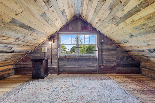 W1511 County Rd Hh, Fremont, WI 54940 - bonus room with wooden walls, lofted ceiling, wood ceiling, and wood-type flooring