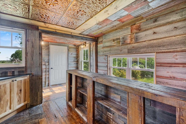 W1511 County Rd Hh, Fremont, WI 54940 - hall with wooden walls and dark wood-style floors