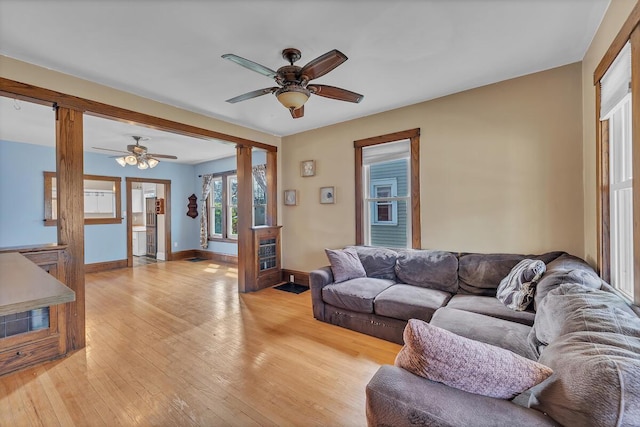 1235 Grove Ave, Racine, WI 53405 - living room featuring a ceiling fan and light wood-style floors