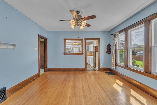 1235 Grove Ave, Racine, WI 53405 - unfurnished room with light wood-style flooring and a ceiling fan