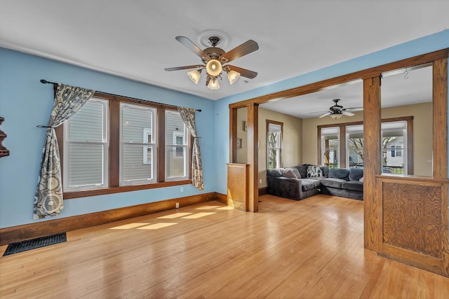 1235 Grove Ave, Racine, WI 53405 - living room featuring ceiling fan and light wood-style floors