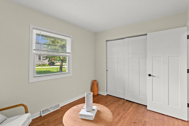5717 S 42nd St, Greenfield, WI 53221 - sitting room featuring wood finished floors