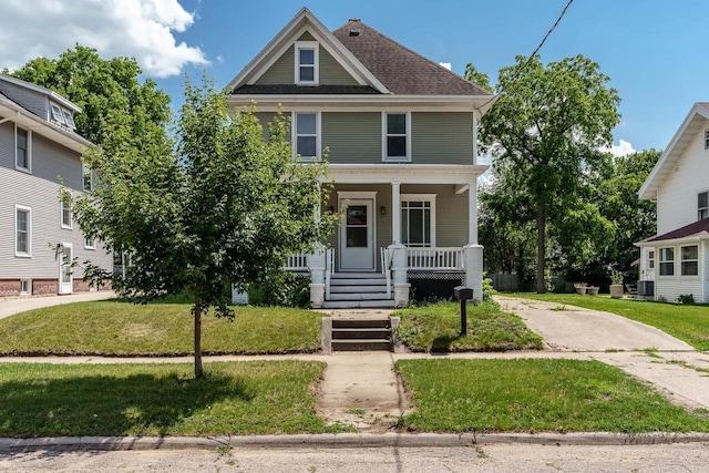 716 Vernon Ave, Beloit, WI 53511 - american foursquare style home with a porch and a front lawn