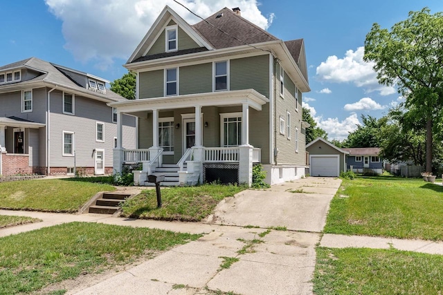 716 Vernon Ave, Beloit, WI 53511 - traditional style home featuring concrete driveway, covered porch, a garage, an outdoor structure, and a front lawn