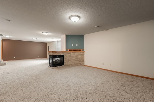 1163 Pine Acre Ln, Chippewa Falls, WI 54729 - below grade area featuring a multi sided fireplace, carpet floors, and a textured ceiling