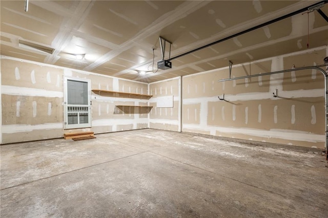 1163 Pine Acre Ln, Chippewa Falls, WI 54729 - garage featuring a garage door opener