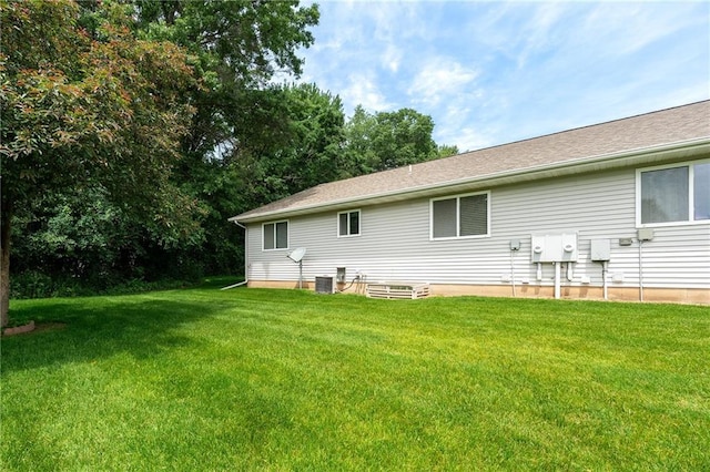 1163 Pine Acre Ln, Chippewa Falls, WI 54729 - rear view of property featuring a lawn