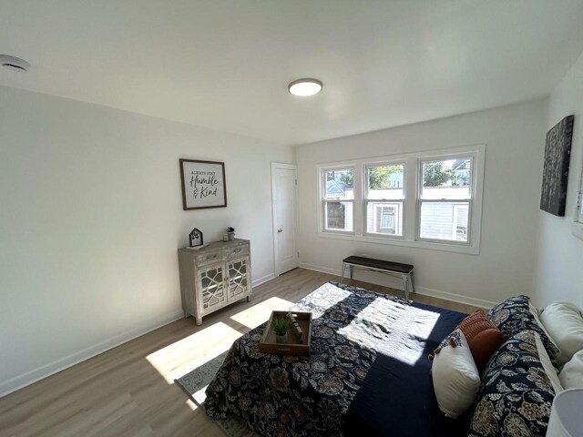 3041 N 52nd St, Milwaukee, WI 53210 - living area with light wood-style flooring and baseboards