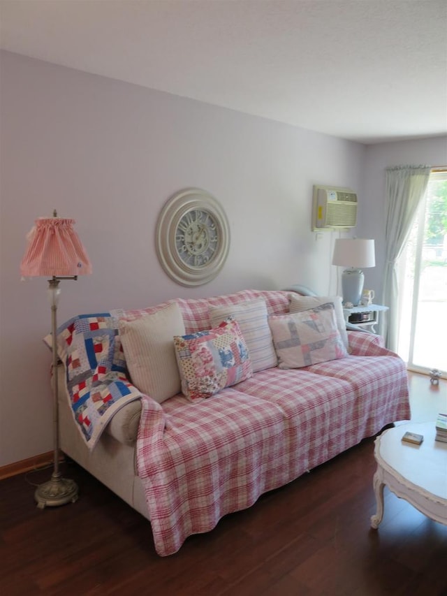 306 N Sales St Unit # 1, Merrill, WI 54452 - living area with a wall mounted air conditioner and wood finished floors