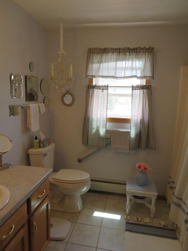 306 N Sales St Unit # 1, Merrill, WI 54452 - full bathroom featuring baseboard heating, tile patterned flooring, and vanity