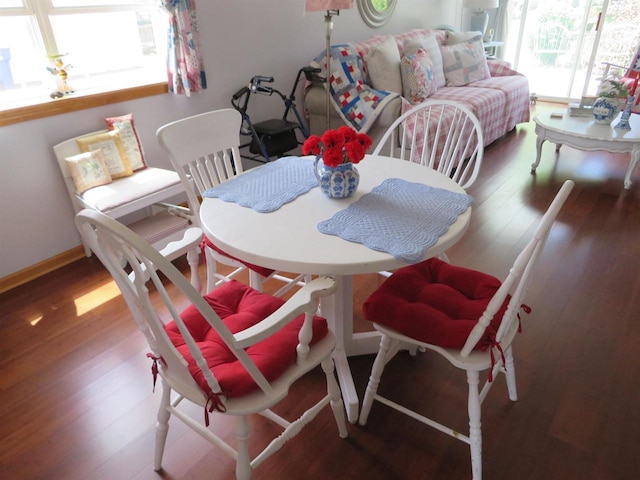 306 N Sales St Unit # 1, Merrill, WI 54452 - dining area featuring wood finished floors and baseboards