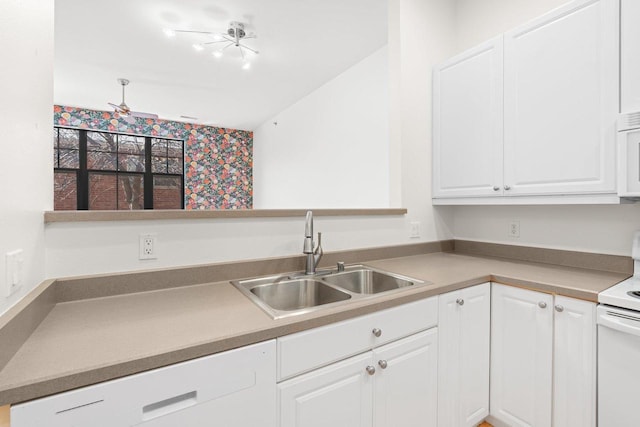 530 W Doty St Unit 107, Madison, WI 53703 - kitchen with white appliances, white cabinets, and light countertops