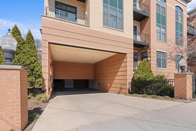 530 W Doty St Unit 107, Madison, WI 53703 - property entrance featuring brick siding and driveway