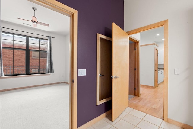 530 W Doty St Unit 107, Madison, WI 53703 - hallway featuring baseboards and light tile patterned floors