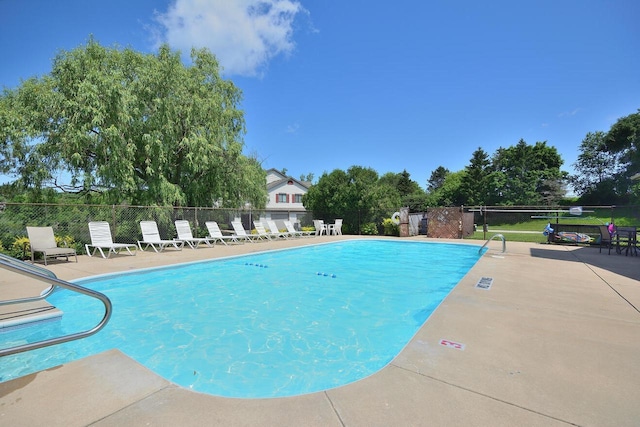 W192S7850 Overlook Bay Rd Unit 3, Muskego, WI 53150 - community pool featuring a patio area