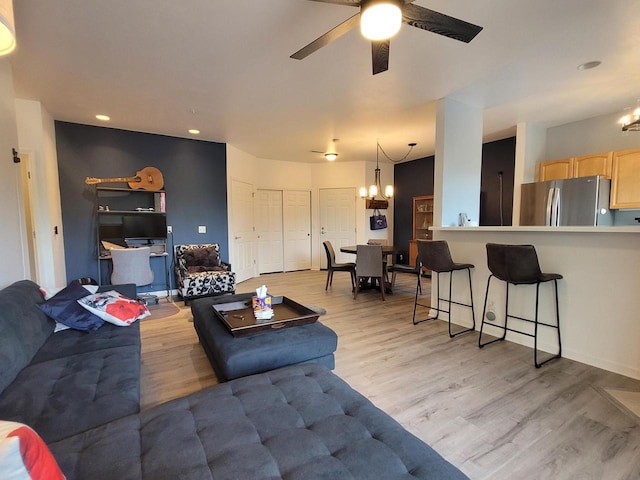 N113W16241 Sylvan Cir Unit 110, Germantown, WI 53022 - living room with a chandelier, a ceiling fan, light wood-type flooring, and recessed lighting